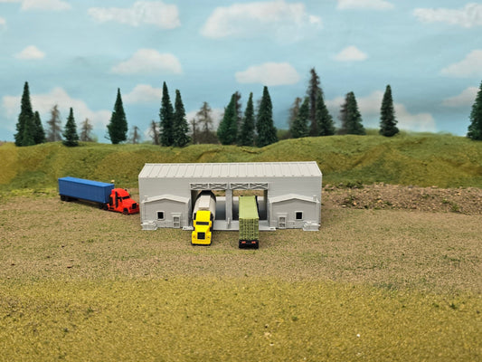 Z scale multi-purpose customs and intermodal facility model kit with two covered drive-thru lanes, overhead signs, and four office interiors – ideal for freight yard or border crossing scenes.